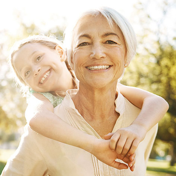 grandma and grandchild having fun at the park