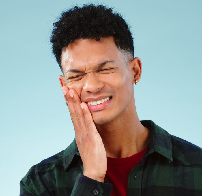 Young Man facing Teeth Pain - Emergency Dentist in S&C Dental BH