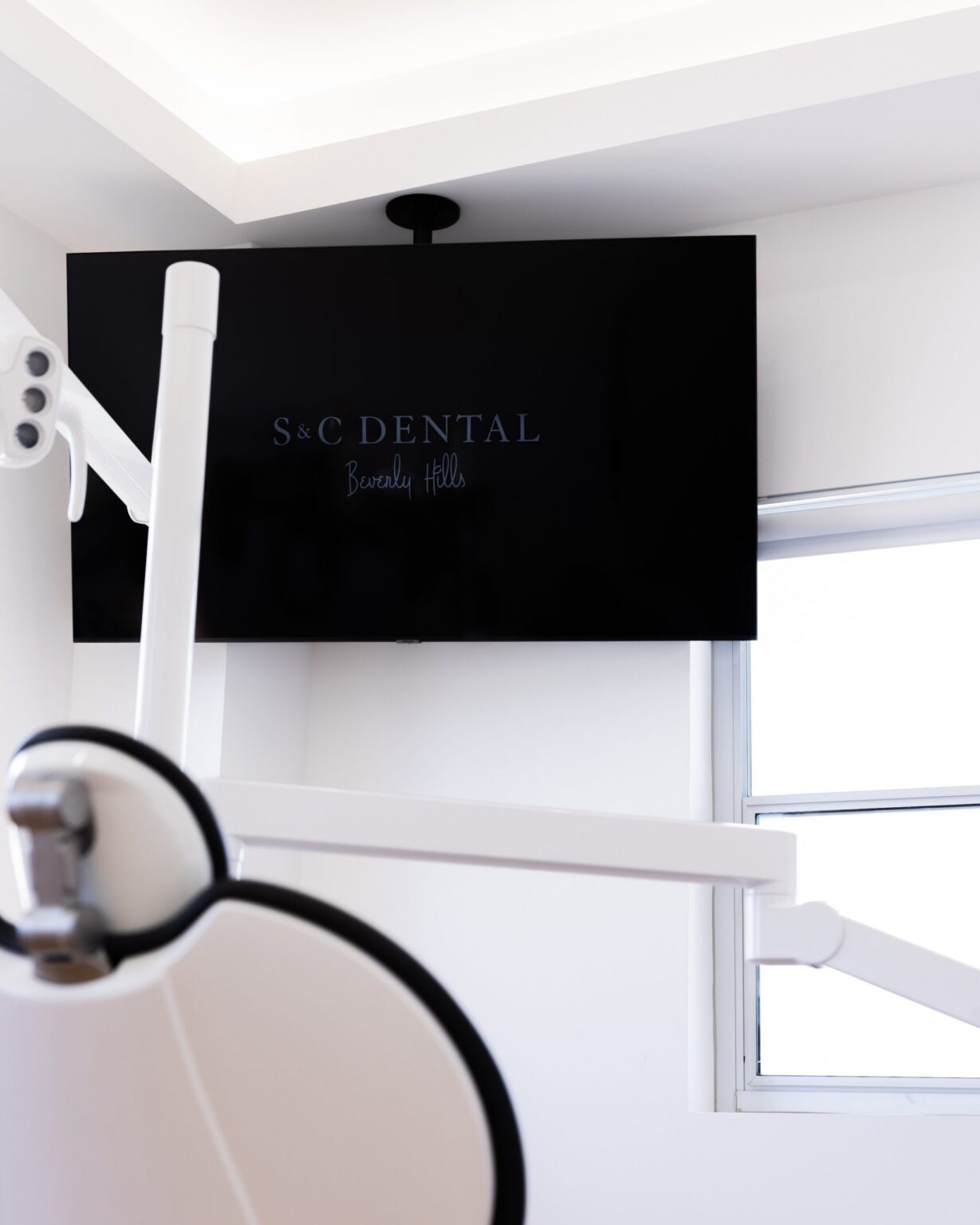 An overhead treatment room monitor at S&C Dental Beverly Hills