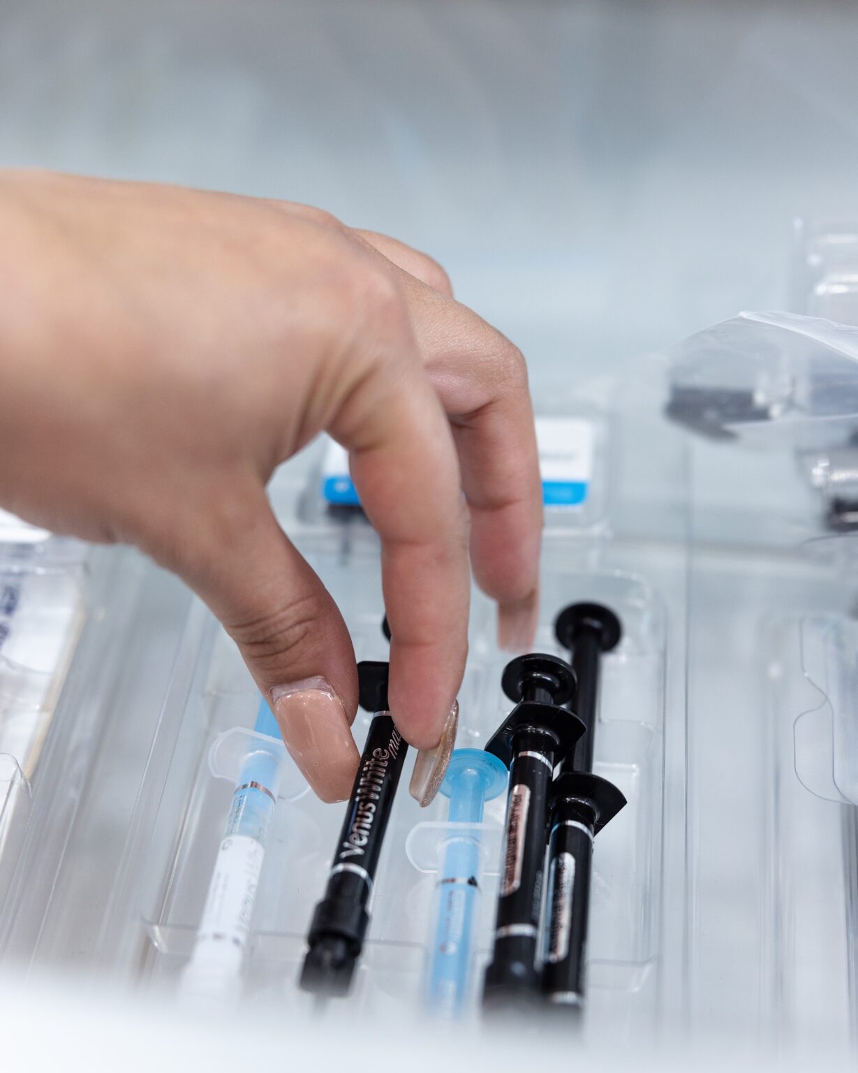Selecting composite and anesthetic supplies from a treatment drawer